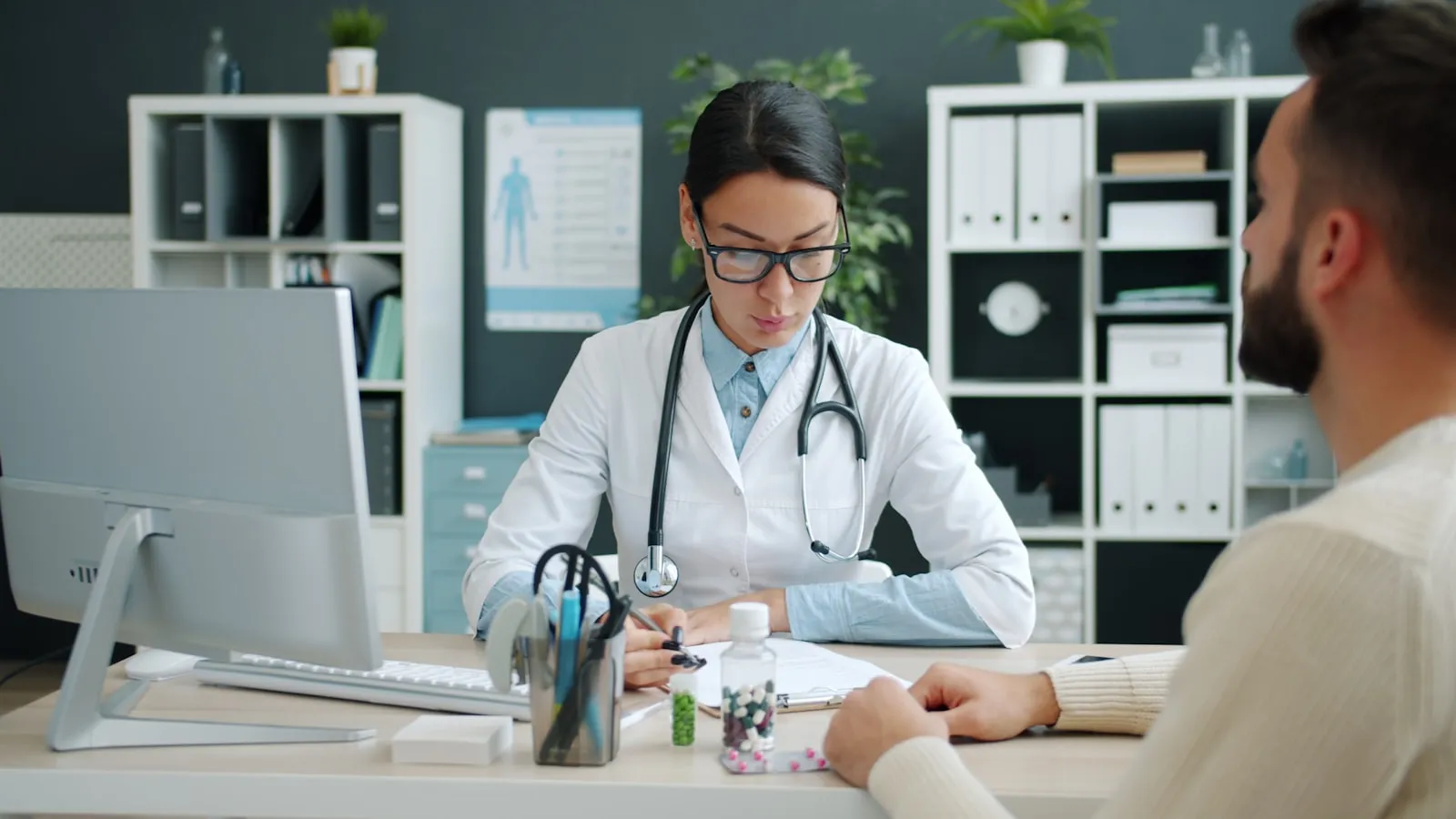 Healthcare provider consulting with a patient